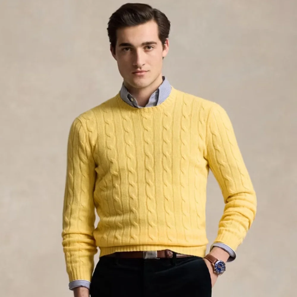 Men’s large yellow is Tommy Hilfiger sweater